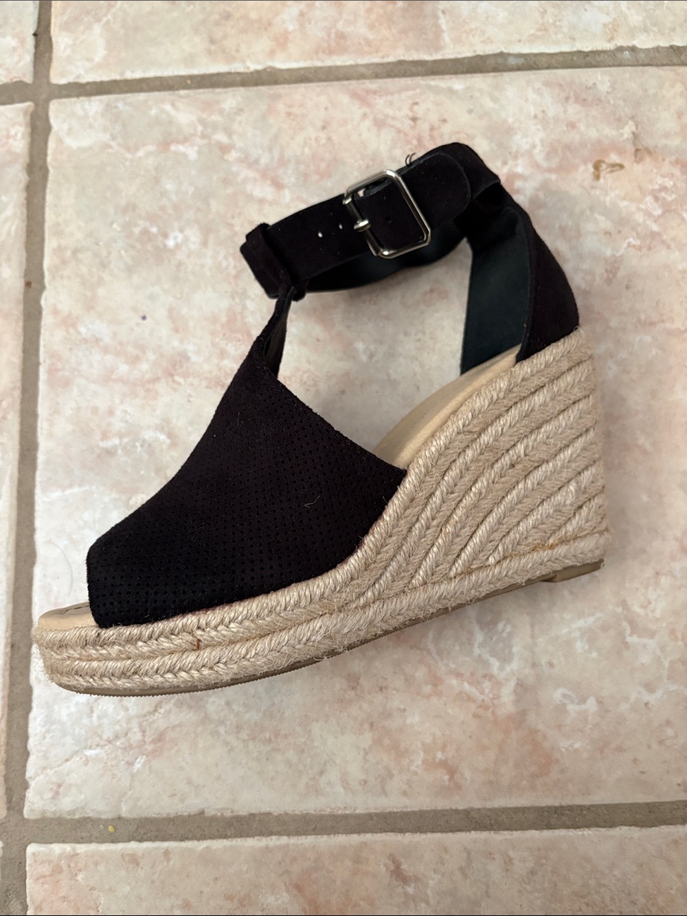 Women’s wedge Cityclassified sandal.
Size 6 1/2. Good shape.